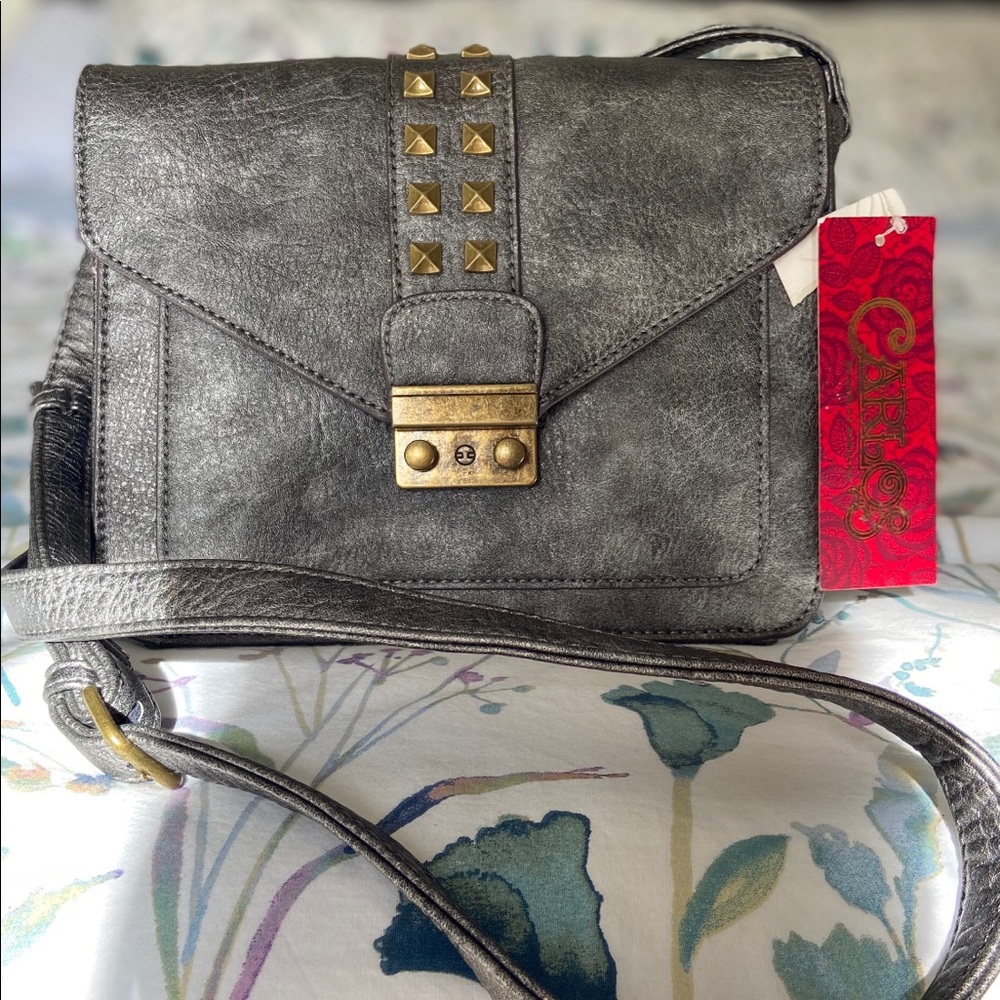 Carlos Santana new handbag with original tag.